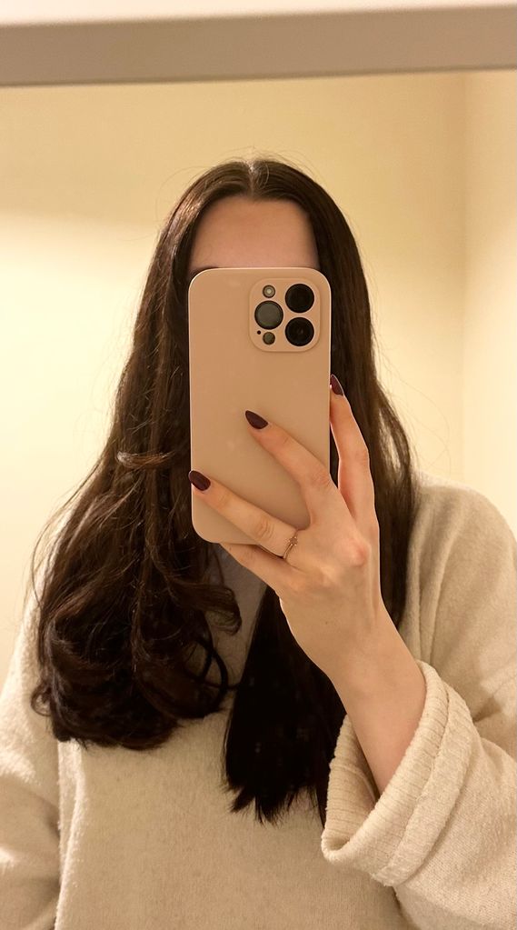 mirror selfie of half curled hair
