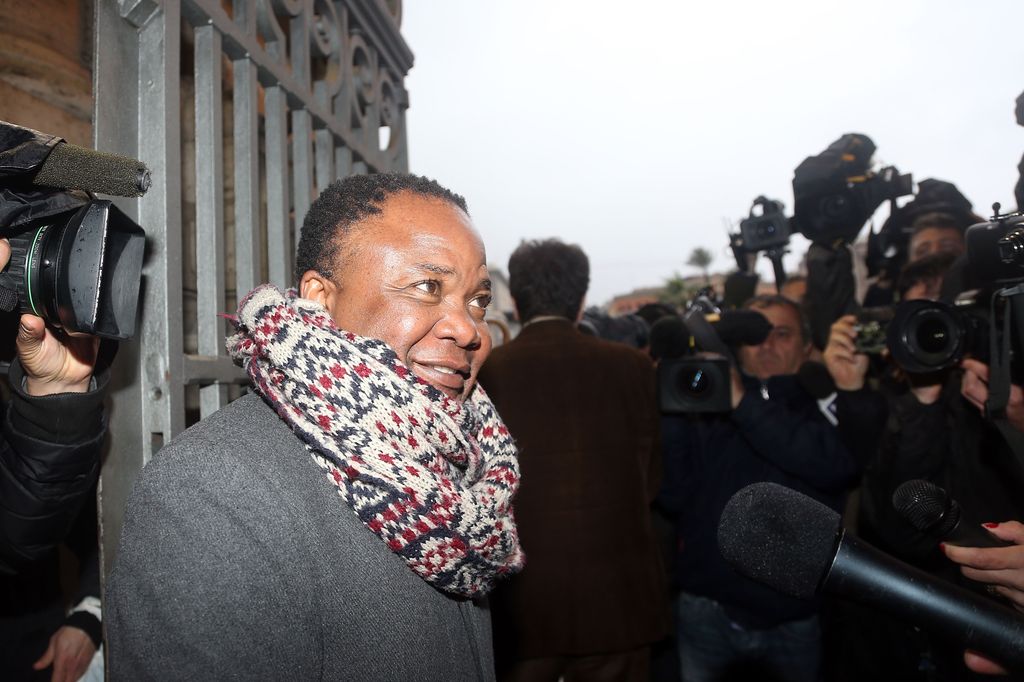 Patrick Lumumba speaking to media as he leaves a courthouse