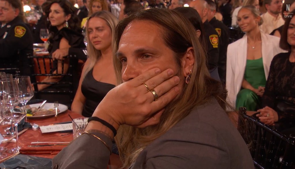 Zoe Saldaña's husband Marco visibly emotional while watching her collect SAG Award