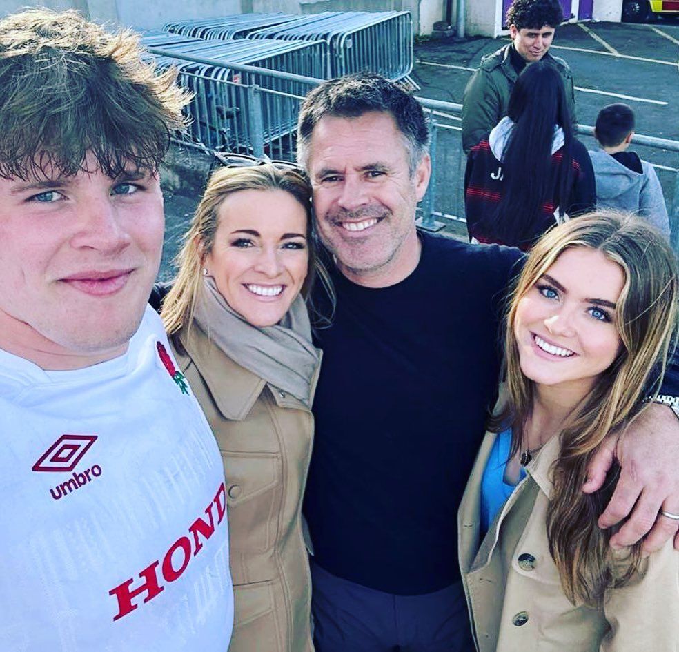 Gabby and Kenny Logan share a sweet moment with their children Reuben and Lois