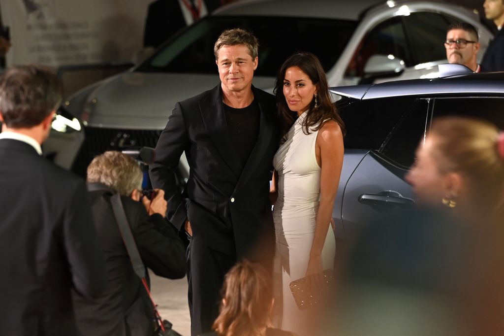 Brad Pitt and girlfriend Ines de Ramon attend the premiere of the film "Wolfs" at the 81st Venice International Film Festival