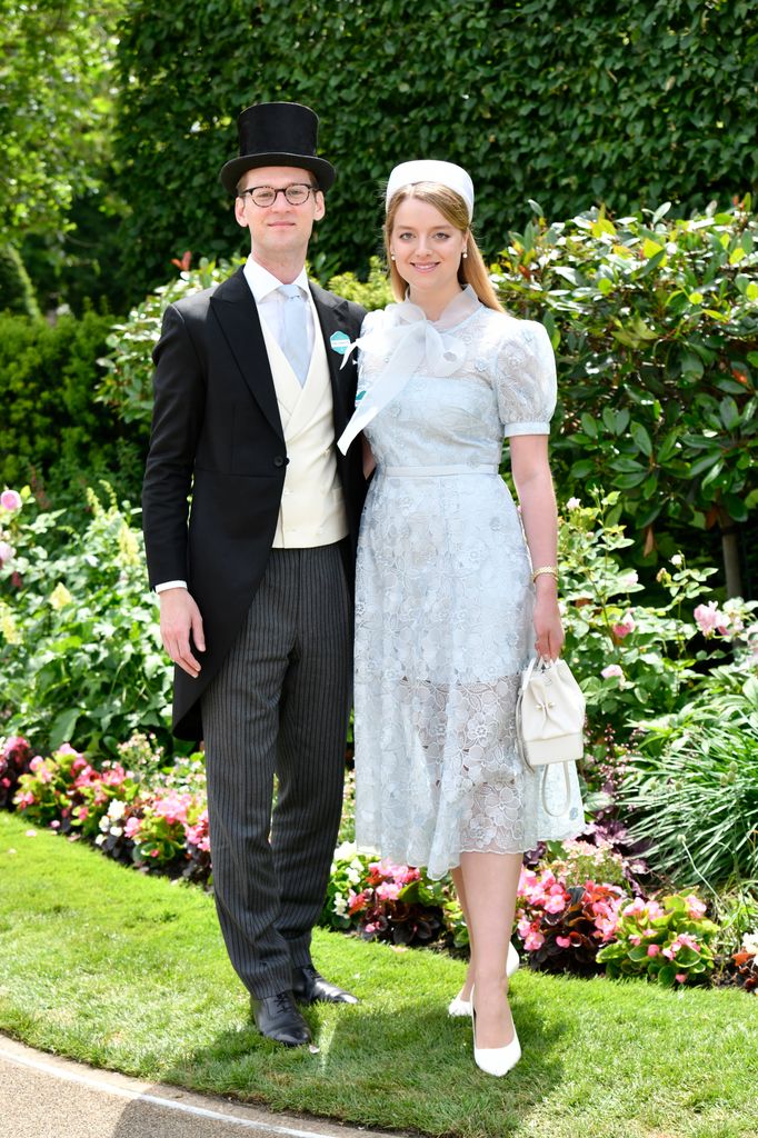 Flora in lace dress with Timothy Vesterberg in tails