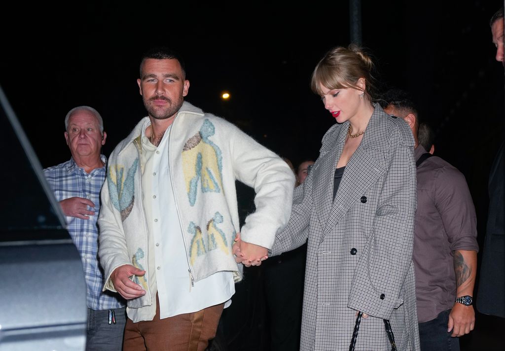 NEW YORK, NEW YORK - OCTOBER 15: Travis Kelce and Taylor Swift depart the SNL Afterparty on October 15, 2023 in New York City. (Photo by Gotham/GC Images)