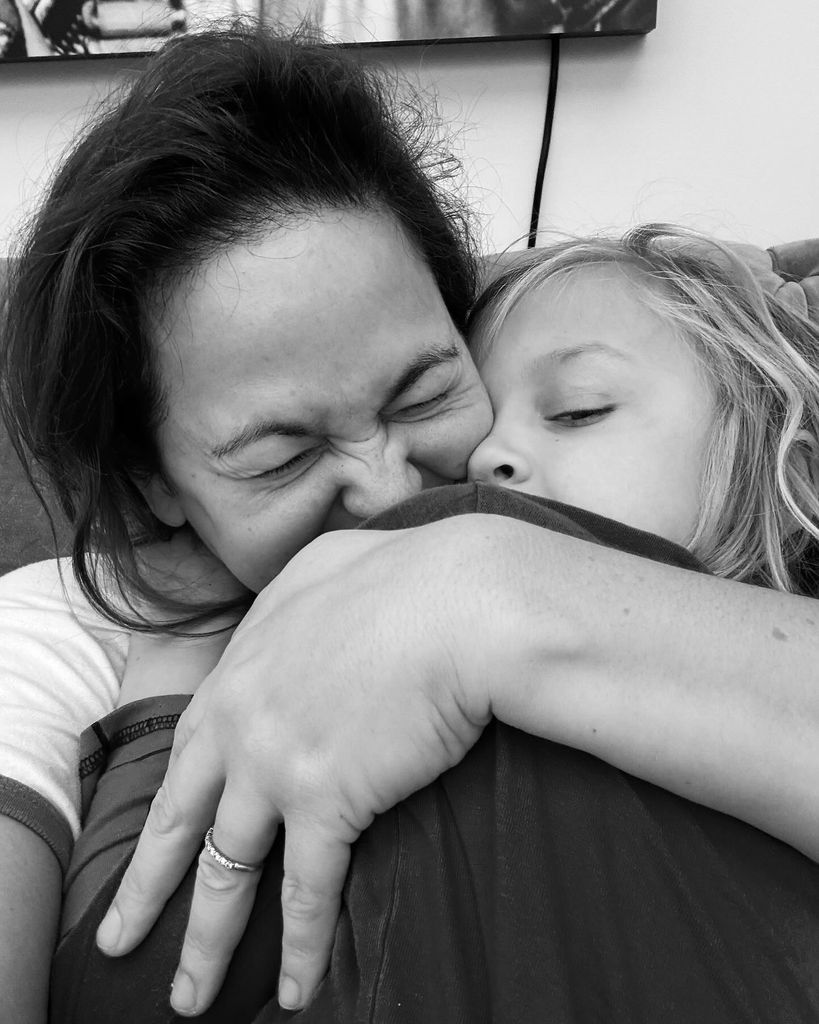 Giovanna kissing son