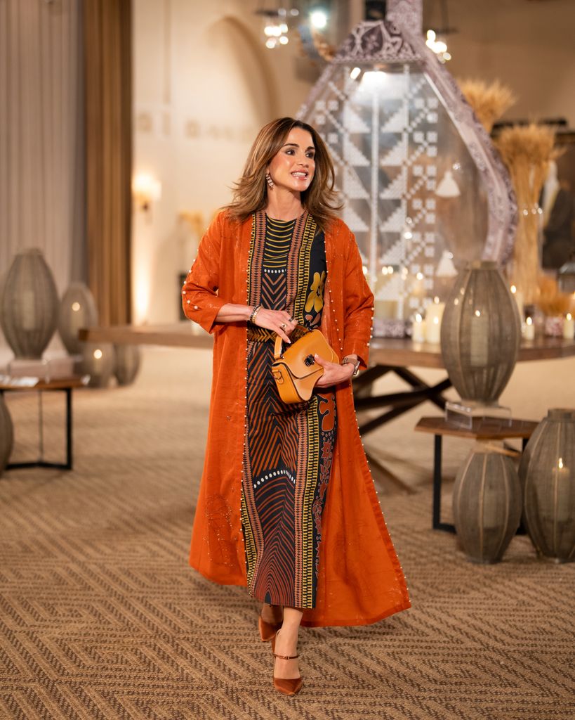 Queen Rania looked incredible in a maxi dress and abaya from Lebanese brand Sarah's Bag