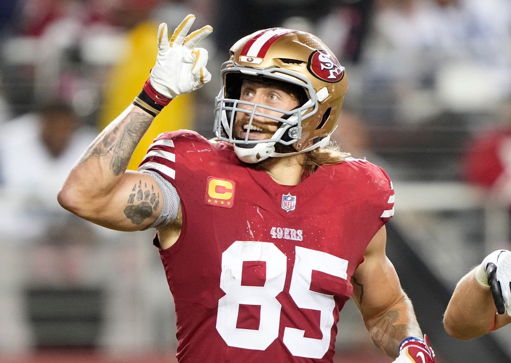 George Kittle #85 of the San Francisco 49ers celebrates after a touchdown catch during the third quarter against the Dallas Cowboys at Levi's Stadium on October 08, 2023 in Santa Clara, California.