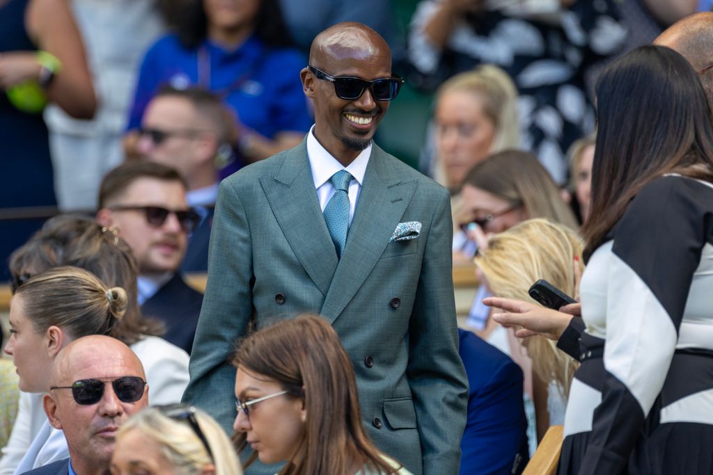 sir mo farah in royal box wearing smart suit