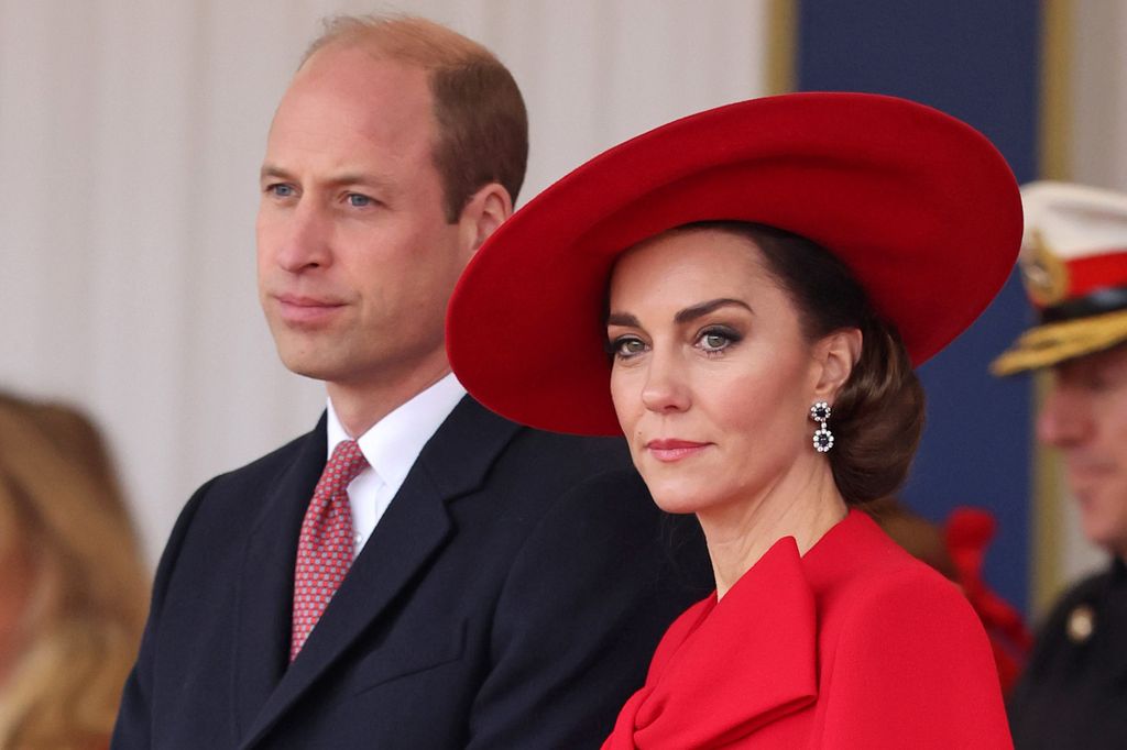 William and Kate in red hat and dress at state visit