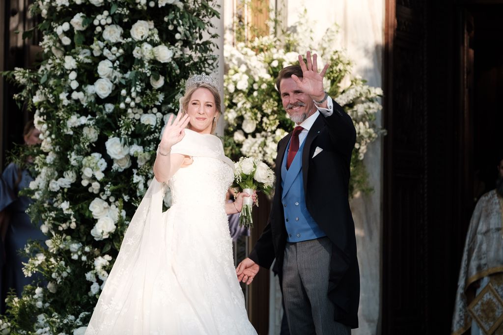 Princess Theodora and her brother Pavlos waving on her wedding day