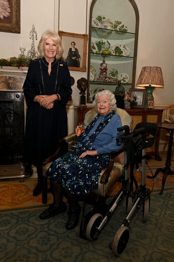 Camilla, Duchess of Cornwall meets with June Spencer during a celebration of "The Archers" 70th anniversary at Clarence House on December 7, 2021 