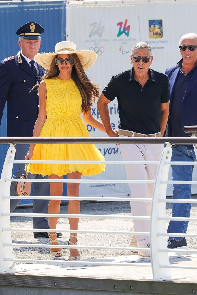 George Clooney and wife Amal are seen arriving at Marco Polo Airport in Venice for the 81st Venice International Film Festival.