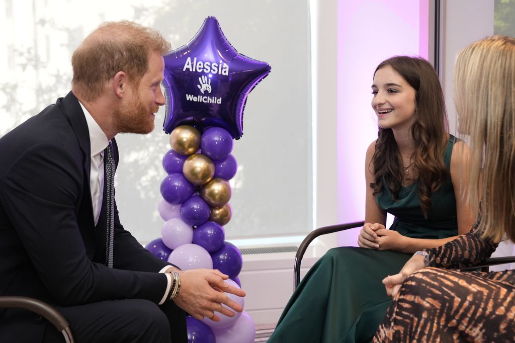 Harry speaking with 14-year-old Alessia, recipient of the Inspirational Sibling award