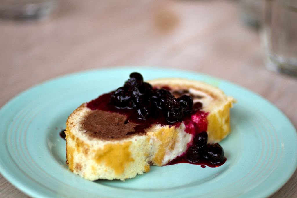 Arctic roll with blackcurrant compote
