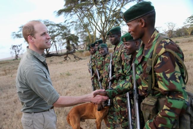 rince William meets armed rangers at the Lewa Wildlife Conservancy in Kenya