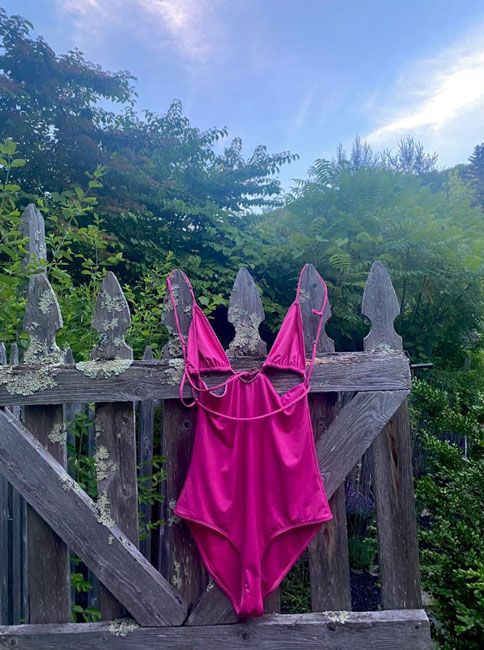 helena christensen pink swimsuit draped