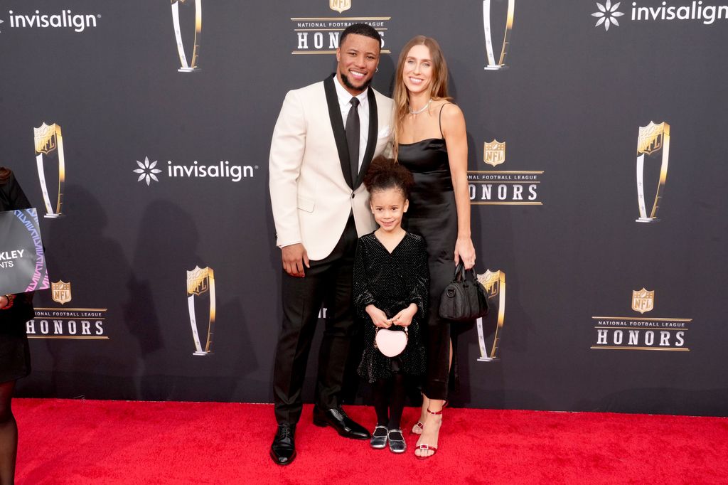 Saquon Barkley and Anna Congdon with their daughter Jada 
