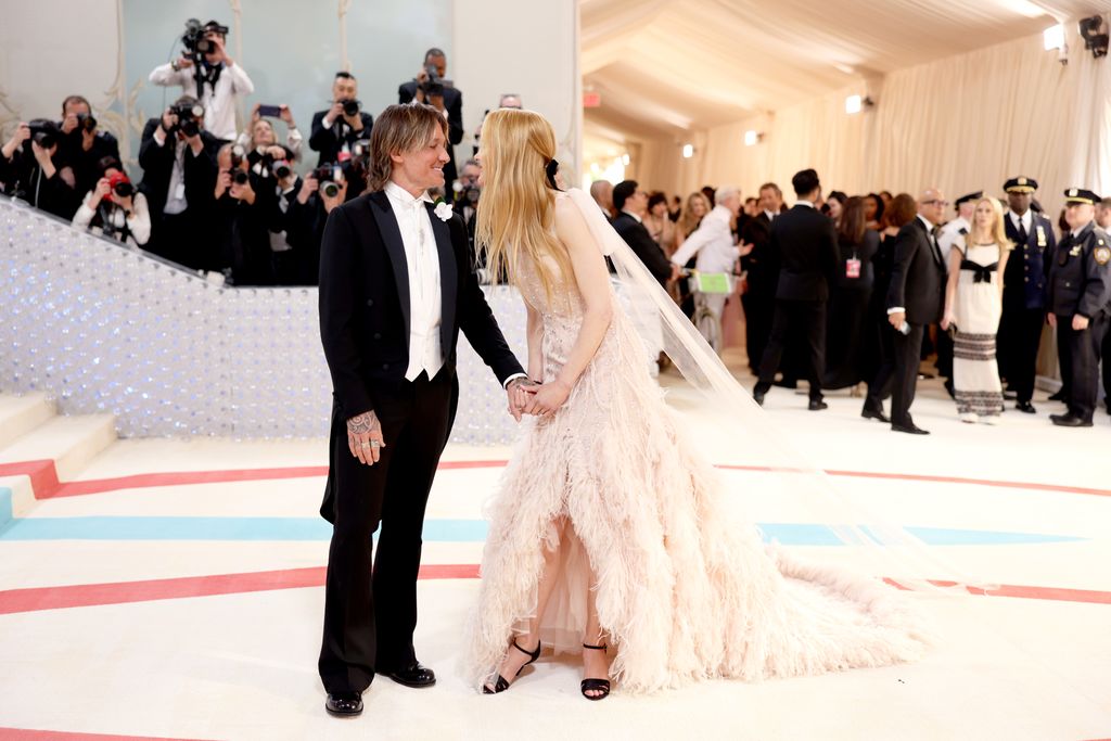 Nicole Kidman and Keith Urban hold hands on the Met Gala 2023 red carpet