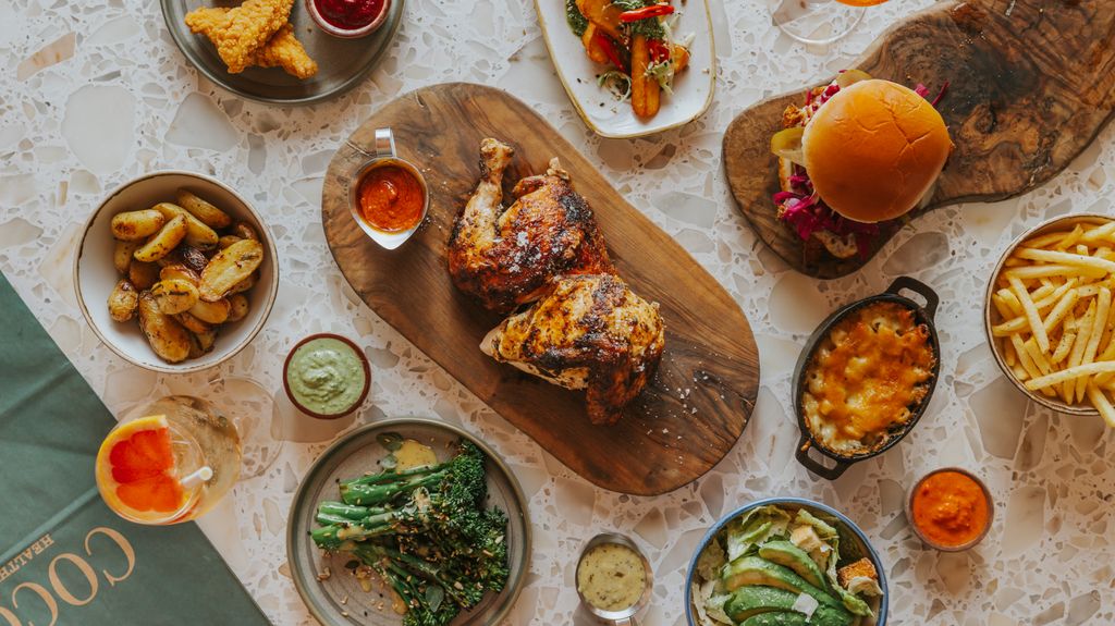 A table with lots of plates of food
