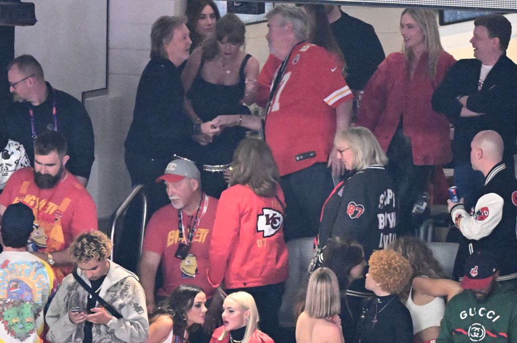 British singer-songwriter Paul McCartney and US singer-songwriter Taylor Swift attend Super Bowl LVIII between the Kansas City Chiefs and the San Francisco 49ers at Allegiant Stadium in Las Vegas, Nevada, February 11, 2024.