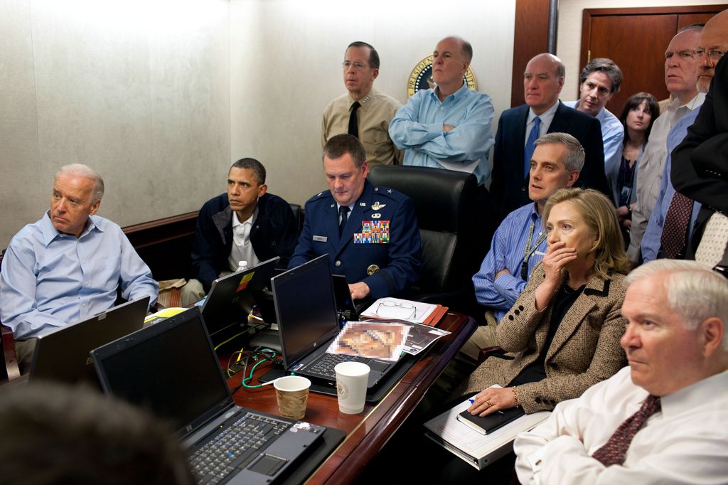 President Barack Obama, Vice President Joe Biden, Secretary of State Hillary Clinton and members of the national security team receive an update on the mission against Osama bin Laden in the Situation Room of the White House May 1, 2011 in Washington, DC.