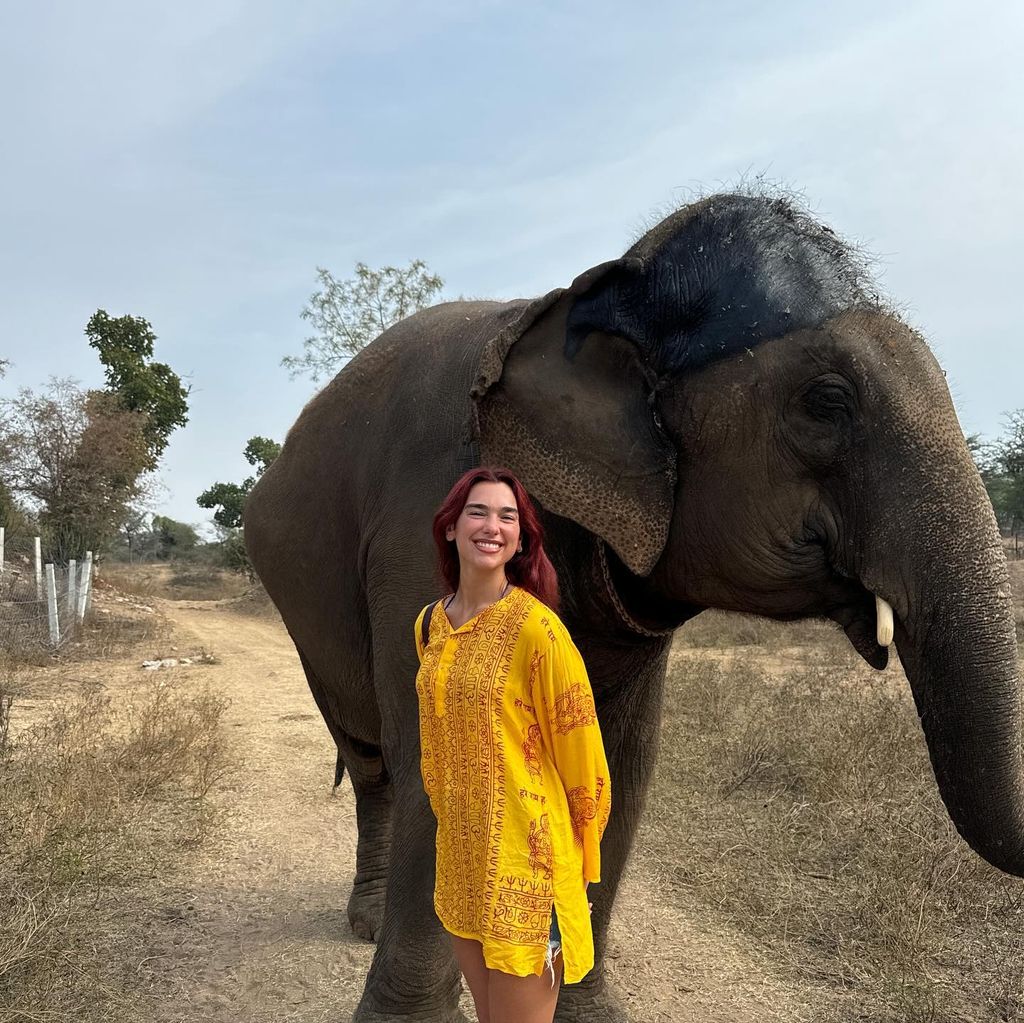 Dua posing with an elephant