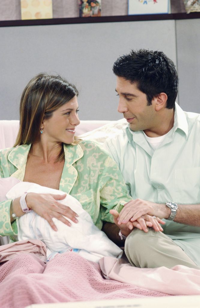 Jennifer Aniston as Rachel Green, David Schwimmer as Ross Geller on Friends in 2002