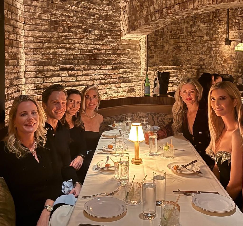 Ivanka Trump surrounded by friends at dinner