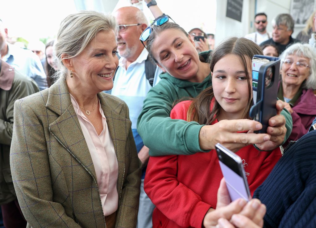 Sophie, Duchess of Edinburgh poses for a selfie with well-wishers