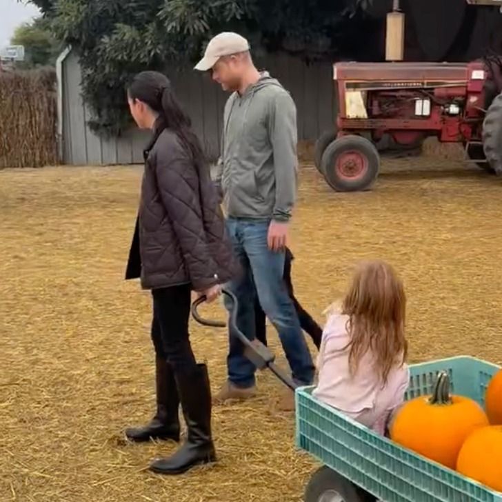 Meghan looked so chic in her Anine Bing jacket as she pulled Lilibet in her wagon