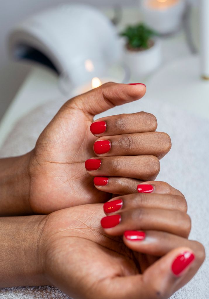 red manicure close up