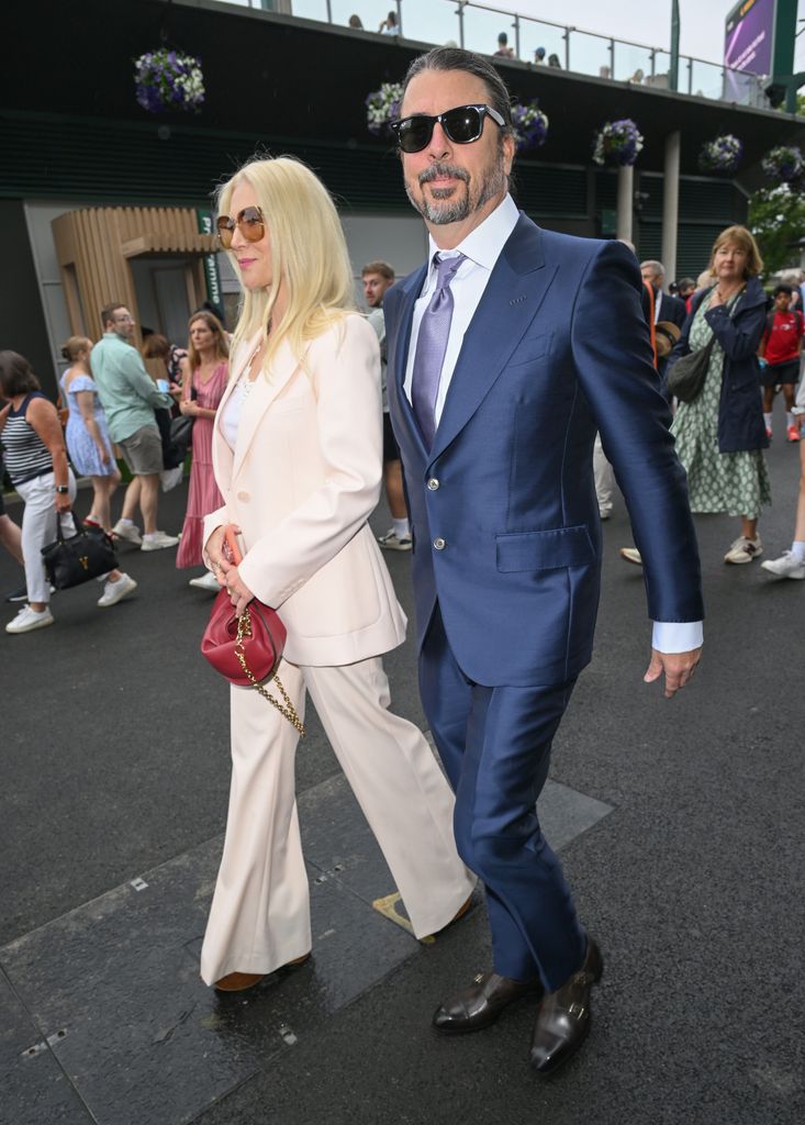 dave grohl and jordyn blum walking at wimbledon 2025