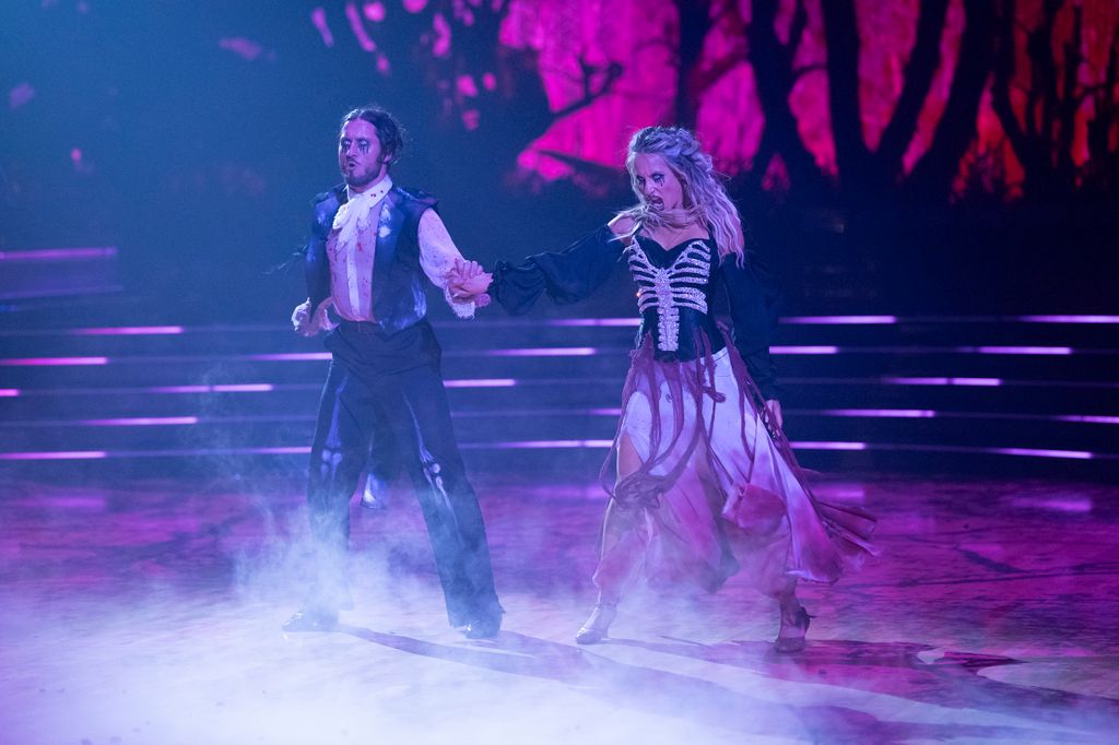 Alix Earle and Val Chmerkovskiy perform during Halloween Night on DWTS