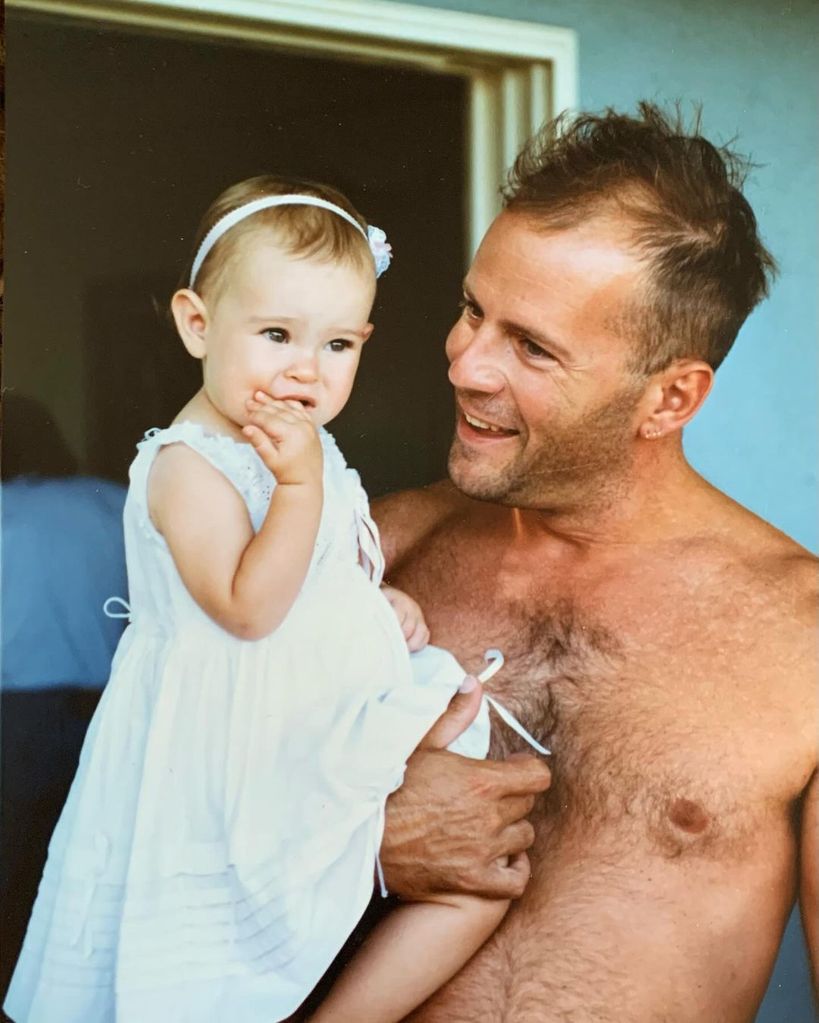 Bruce Willis with a baby Rumer Willis in a throwback photo shared on Instagram