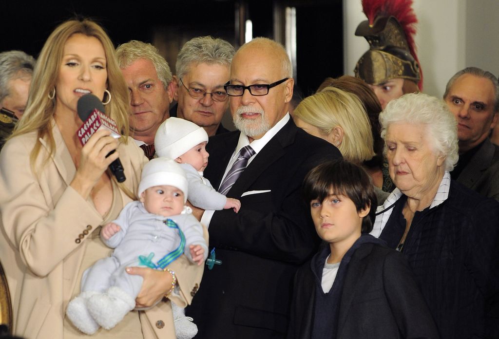 Singer Celine Dion holds her son Nelson Angelil and husband and manager Rene Angelil, holds their son Eddy Angelil next to Rene-Charles Angelil and Dion's mother Therese Dion as they arrive at Caesars Palace on February 16, 2011 in Las Vegas, Nevada. (Photo by Steven Lawton/FilmMagic)