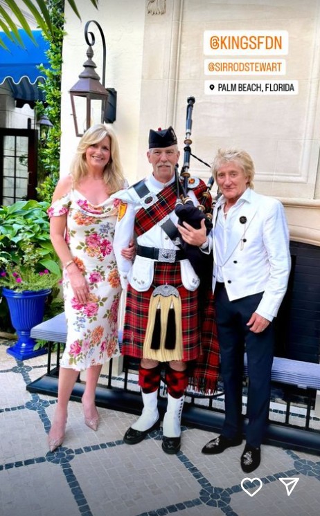 Penny and Rod with man on bagpipes