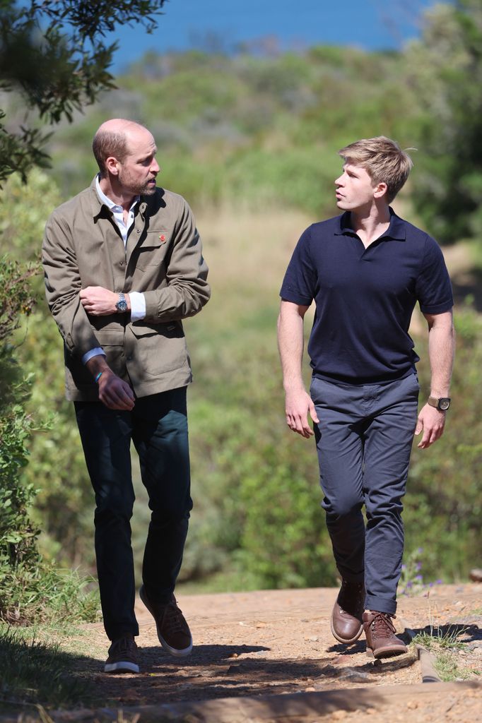 Prince William, Prince of Wales talks to Robert Irwin during his visit at Signal Hill on November 05, 2024 in Cape Town, South Africa