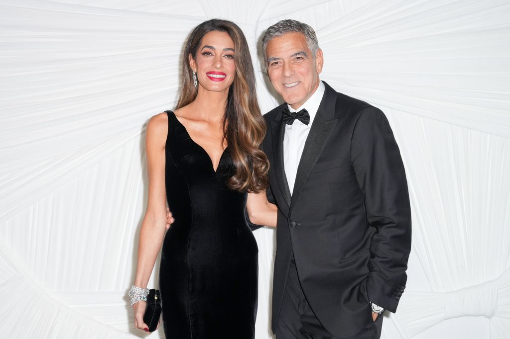 photo of george and amal clooney in black tie