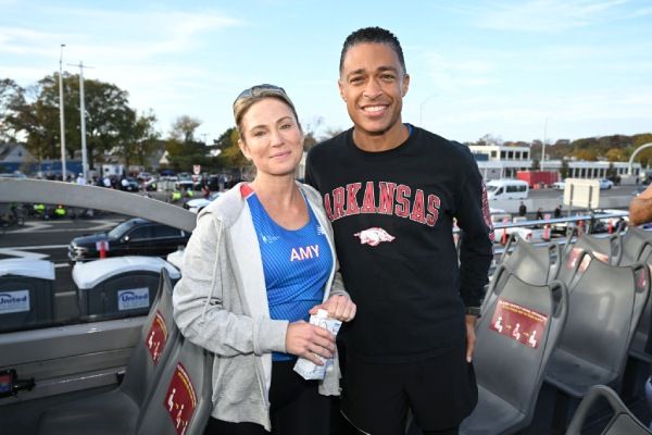 Amy Robach and GMA co host TJ Holmes smile for photo ahead of marathon together 