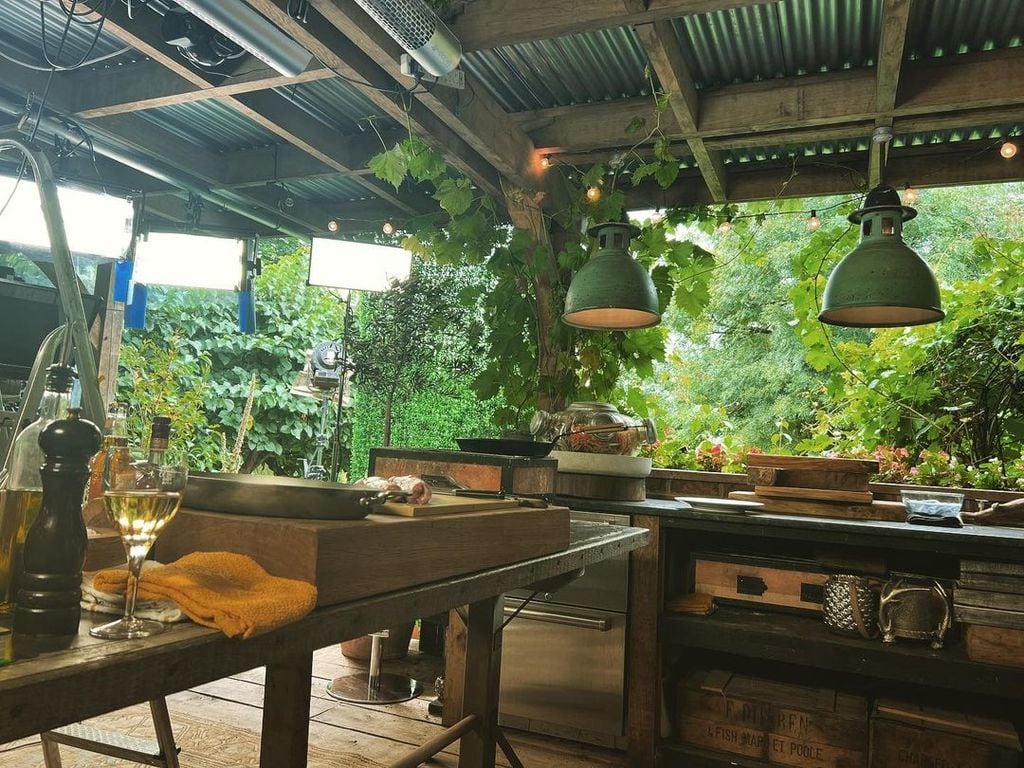 James Martin's outdoor kitchen is surrounded by greenery