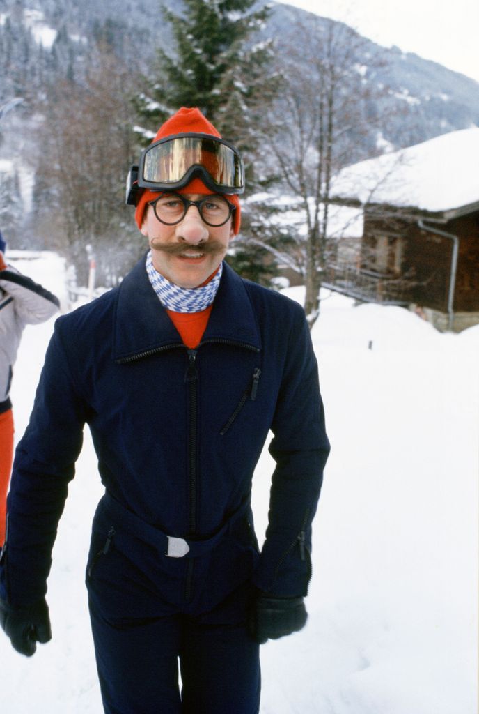 Charles Wearing Joke Mask To Tease Press Photographers During A Skiing Holiday In Klosters, Switzerland 