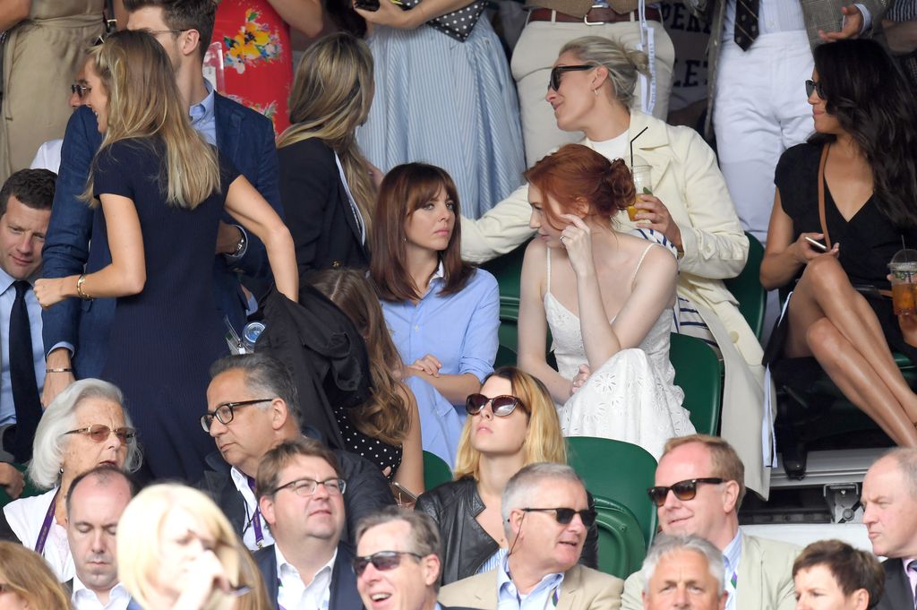 Cressida Bonas (L) and Meghan Markle (R) sat near one another at Wimbledon in 2016
