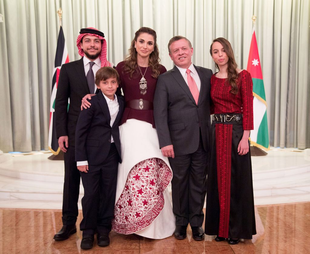 Queen Rania of Jordan poses with King Abdullah II of Jordan and family