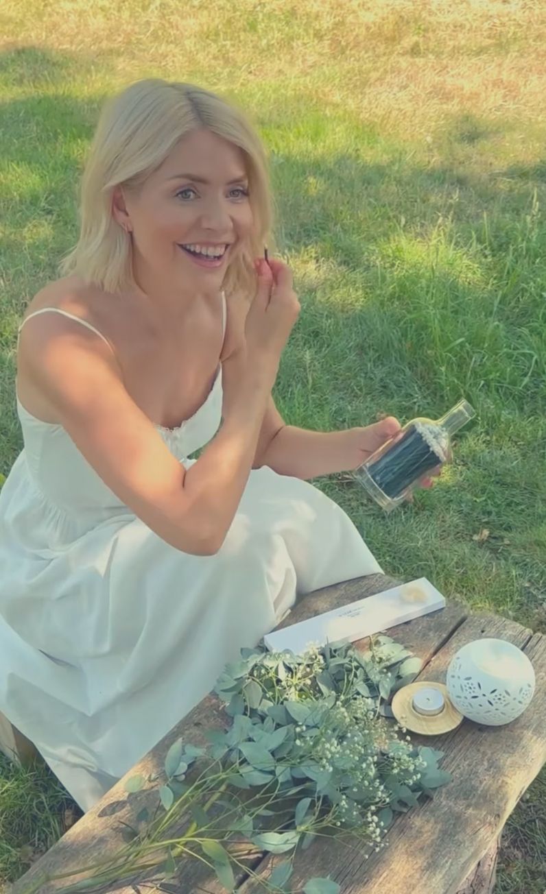 Holly Willoughby wearing a white summer dress. 