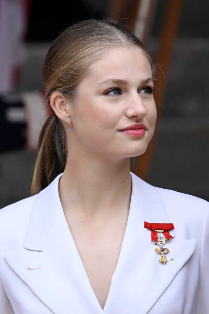 princess leonor smiling in white suit 