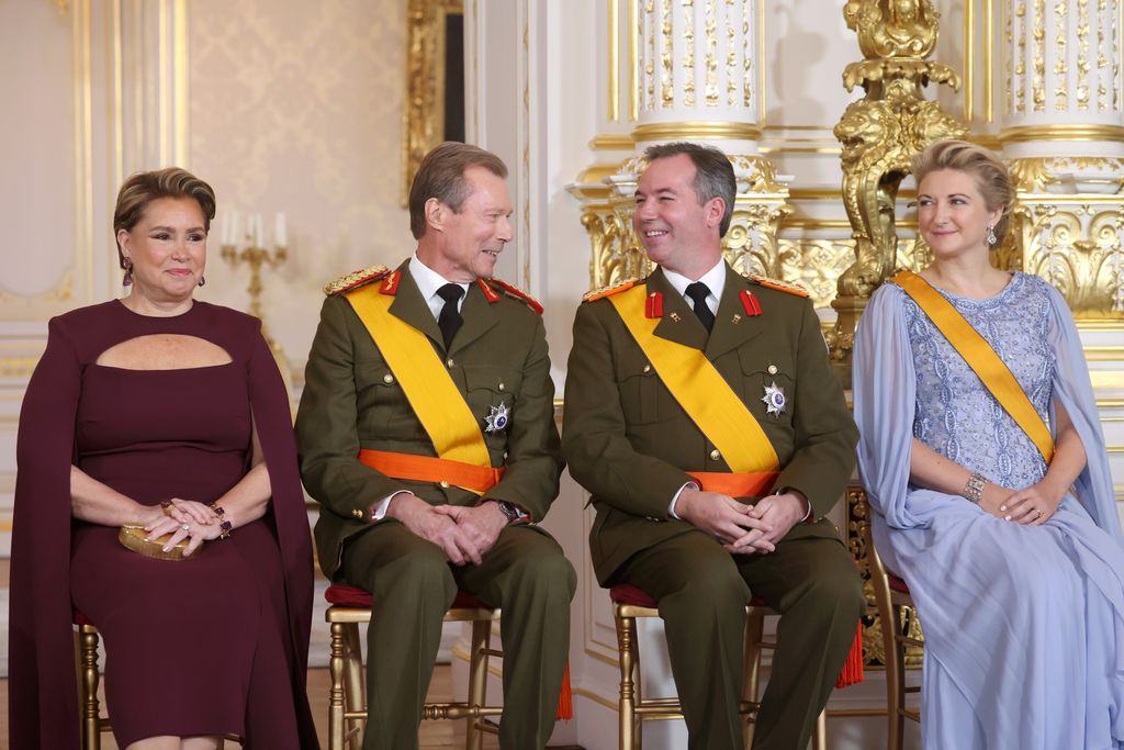 Prince Guillaume and Princess Stephanie seated for the ceremony