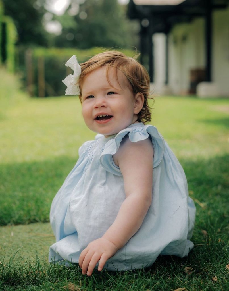 Princess Lilibet Diana in blue dress on her first birthday