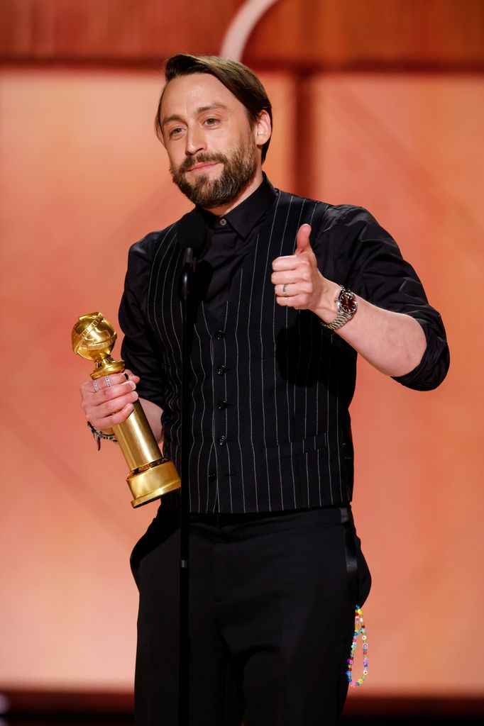 Kieran Culkin accepts the award for Male Supporting Actor - Motion Picture at the 82nd Annual Golden Globe Awards