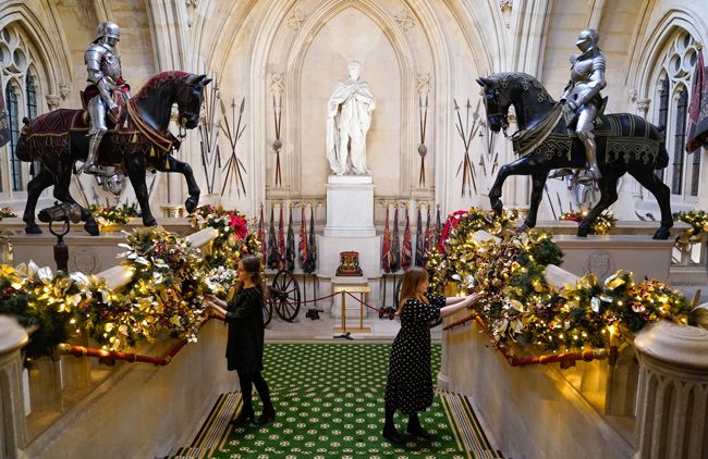 staff preparing royal christmas decorations