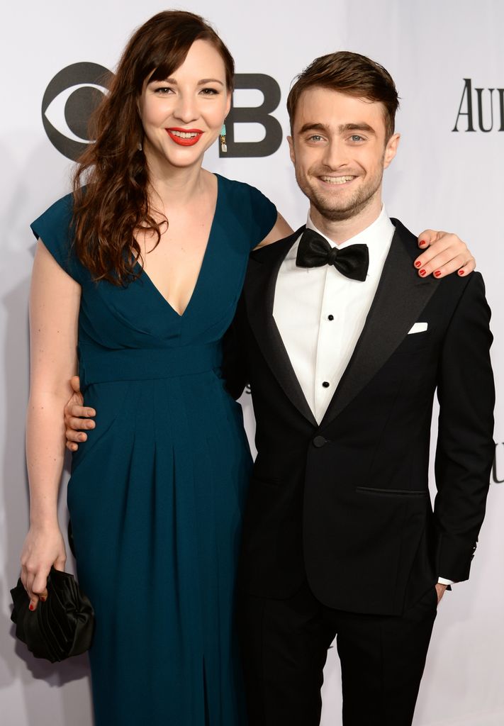 Erin Darke and Daniel Radcliffe attend the 68th Annual Tony Awards at Radio City Music Hall on June 8, 2014 in New York City