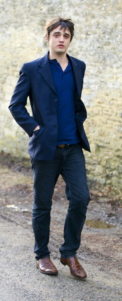 Pete Doherty walking in the countryside